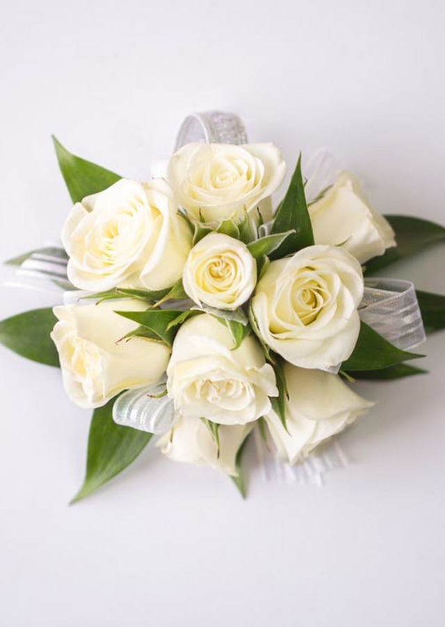 Display of Traditional White Corsage by The Flower Alley